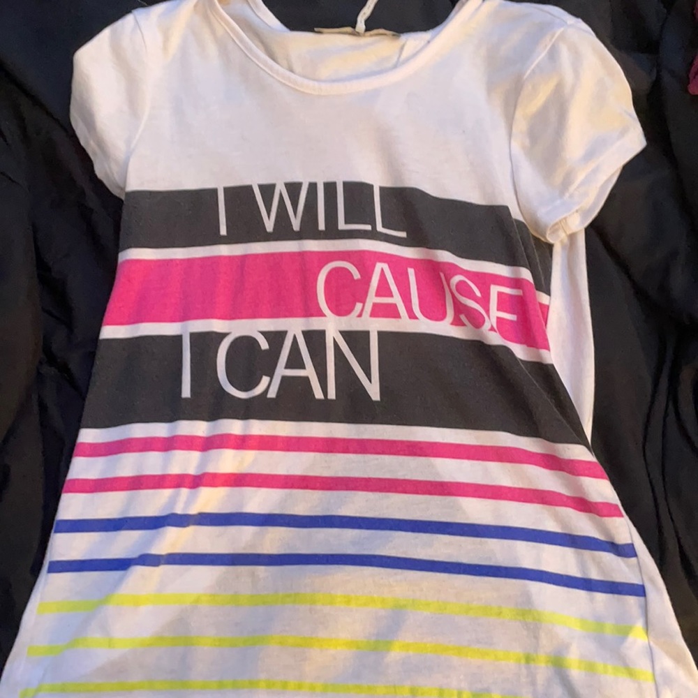 white top with a few stripes and lettering